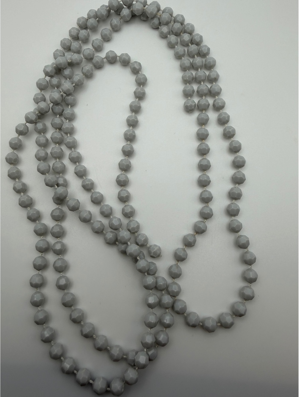 Long gray faceted bead necklace
